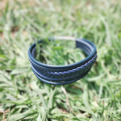 Blue leather bracelet with white clasp